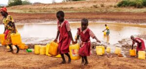 Learners in Hardship areas going for water at kalikuvu -kitui kenya/FILE